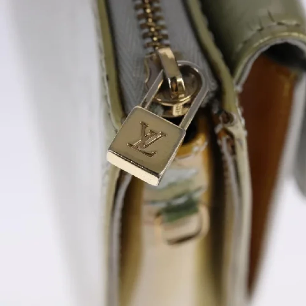 Louis Vuitton Vintage Pre-owned Leather pouches Beige Dames