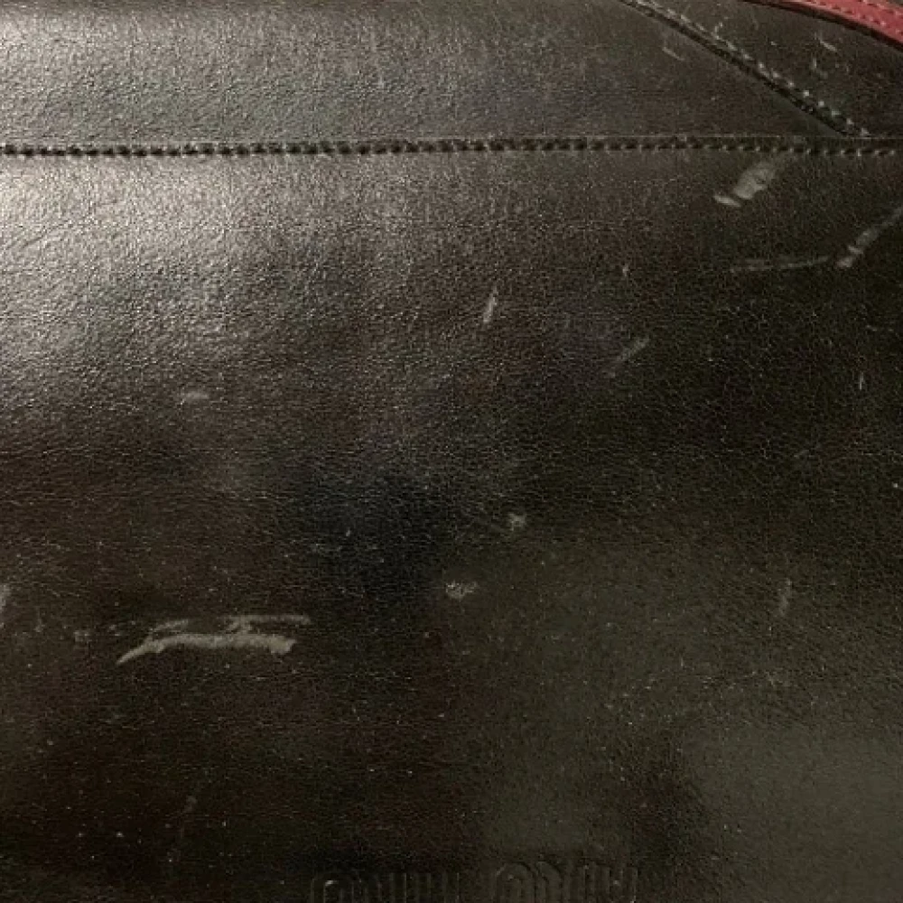 Miu Pre-owned Leather handbags Black Dames