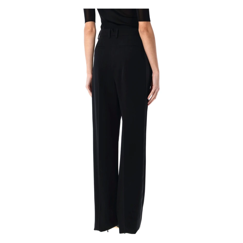 Saint Laurent Zwarte smokingbroek met satijnen banden Black Dames