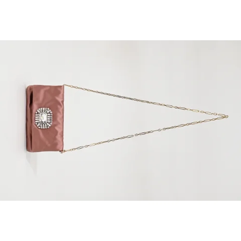Jimmy Choo Pre-owned Fabric clutches Pink Dames