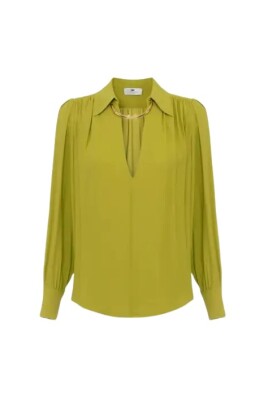 green-v-neck-shirt-with-jewel-accessory