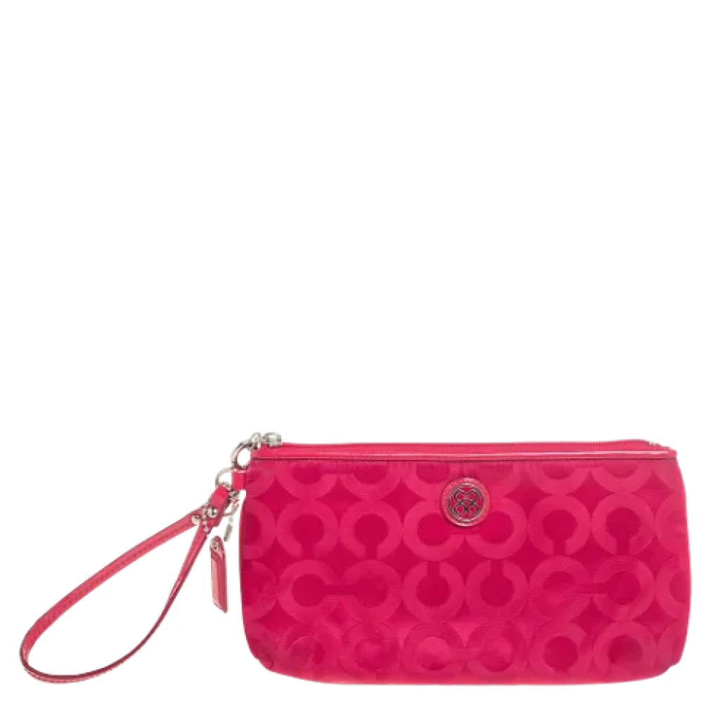 Coach Pre-owned Nylon clutches Pink Dames