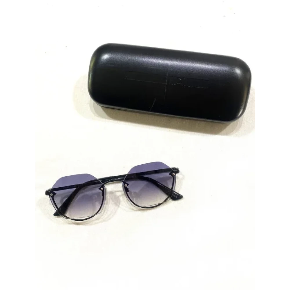Alexander McQueen Pre-owned Metal sunglasses Black Dames
