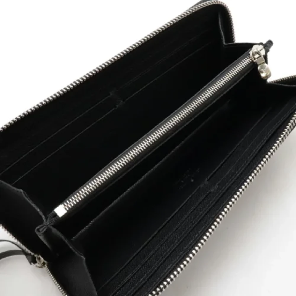 Louis Vuitton Vintage Pre-owned Leather wallets Black Heren
