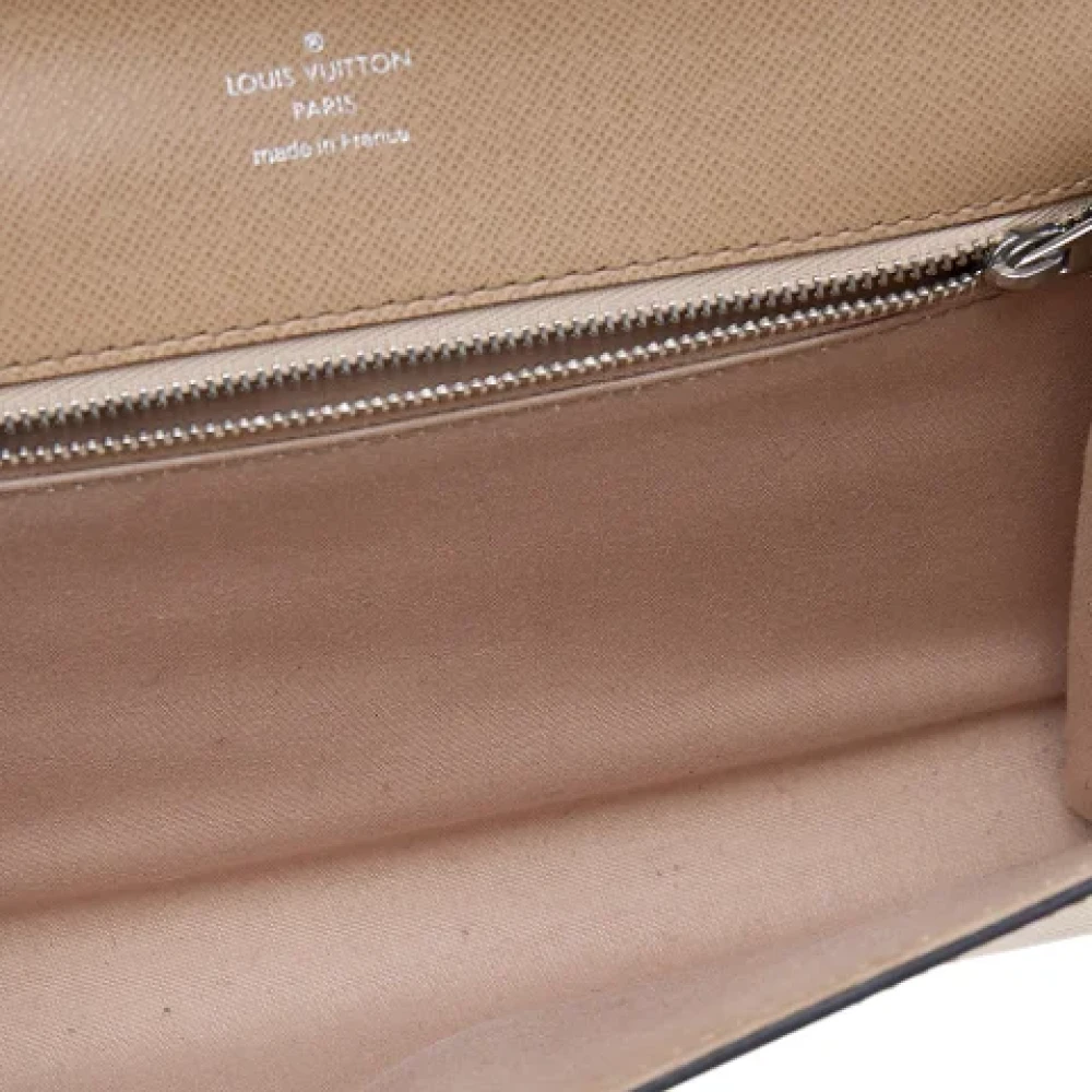 Louis Vuitton Vintage Pre-owned Leather clutches Beige Dames