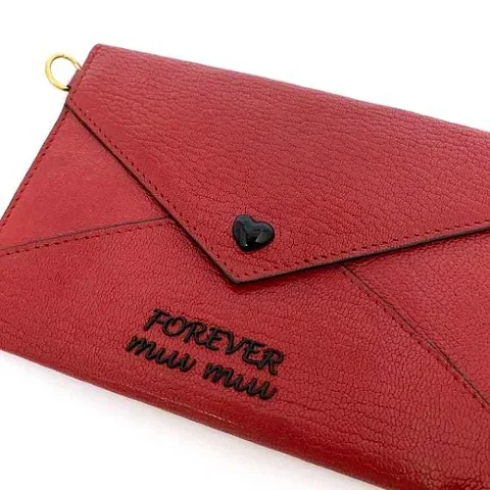 Miu Pre-owned Leather wallets Red Dames