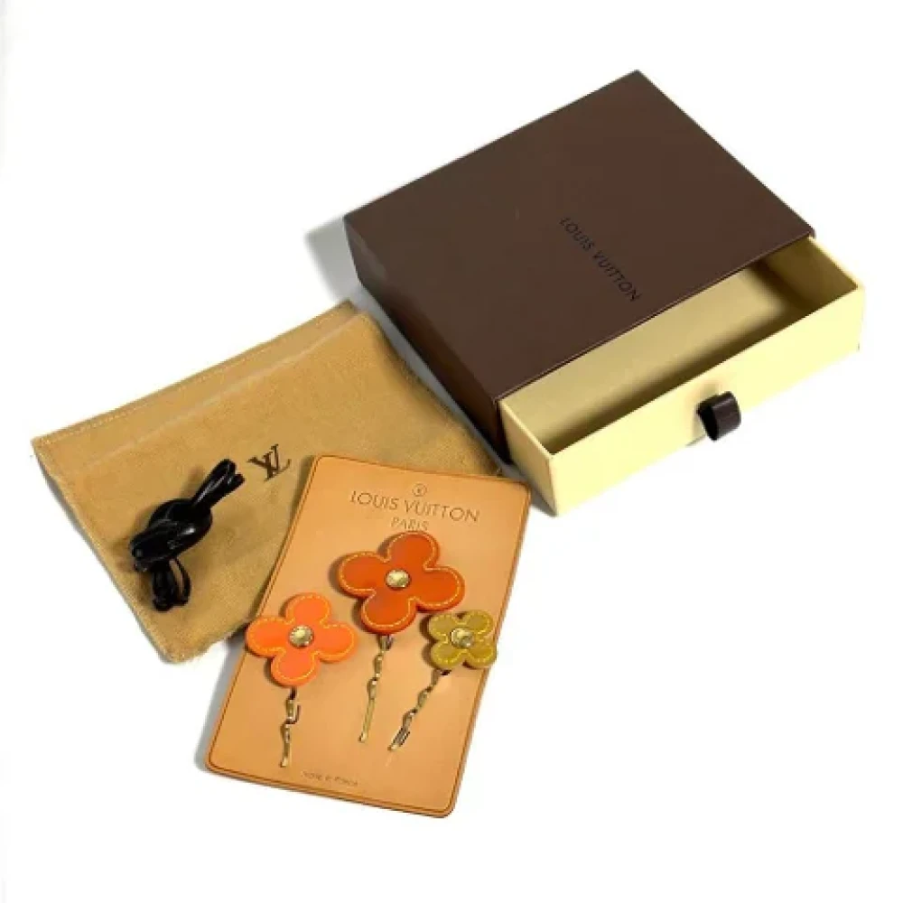 Louis Vuitton Vintage Pre-owned Leather hair-accessories Orange Dames