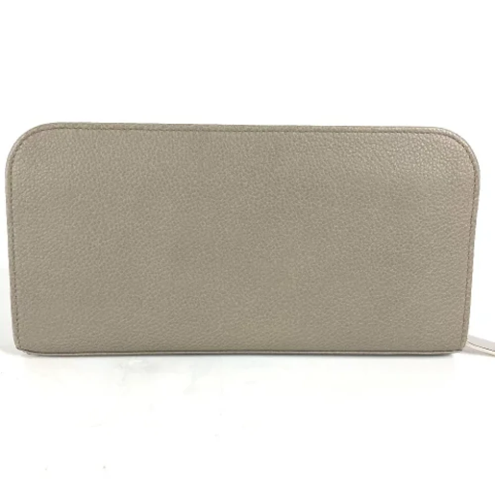 Yves Saint Laurent Vintage Pre-owned Leather wallets Gray Dames