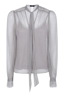 Genomskinlig prickig blus