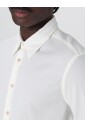 chemise-bleue-en-coton-texture