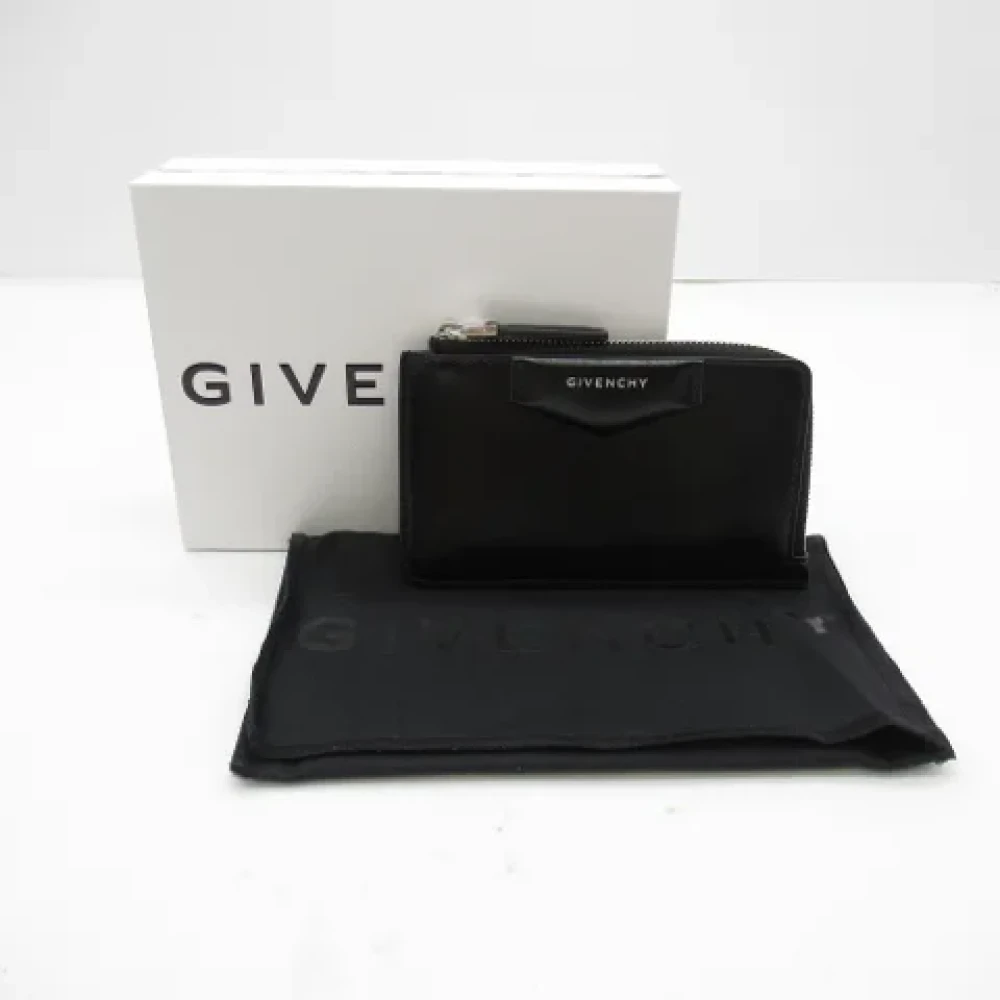 Givenchy Pre-owned Canvas wallets Black Dames