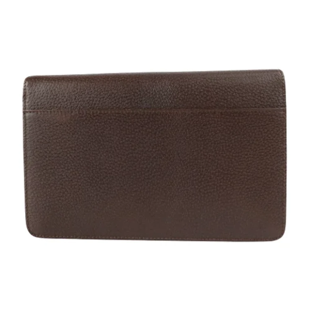 Salvatore Ferragamo Pre-owned Leather clutches Brown Unisex