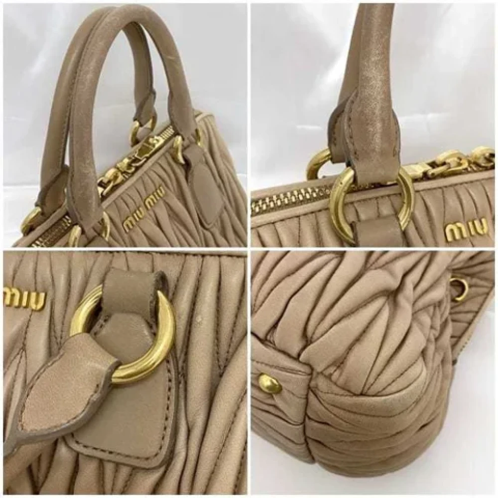 Miu Pre-owned Leather handbags Beige Dames