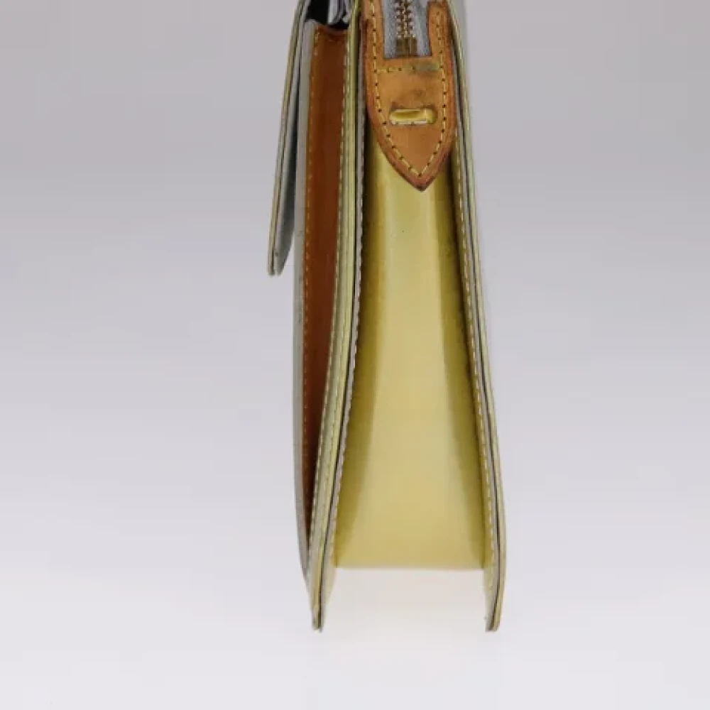 Louis Vuitton Vintage Pre-owned Leather pouches Beige Dames