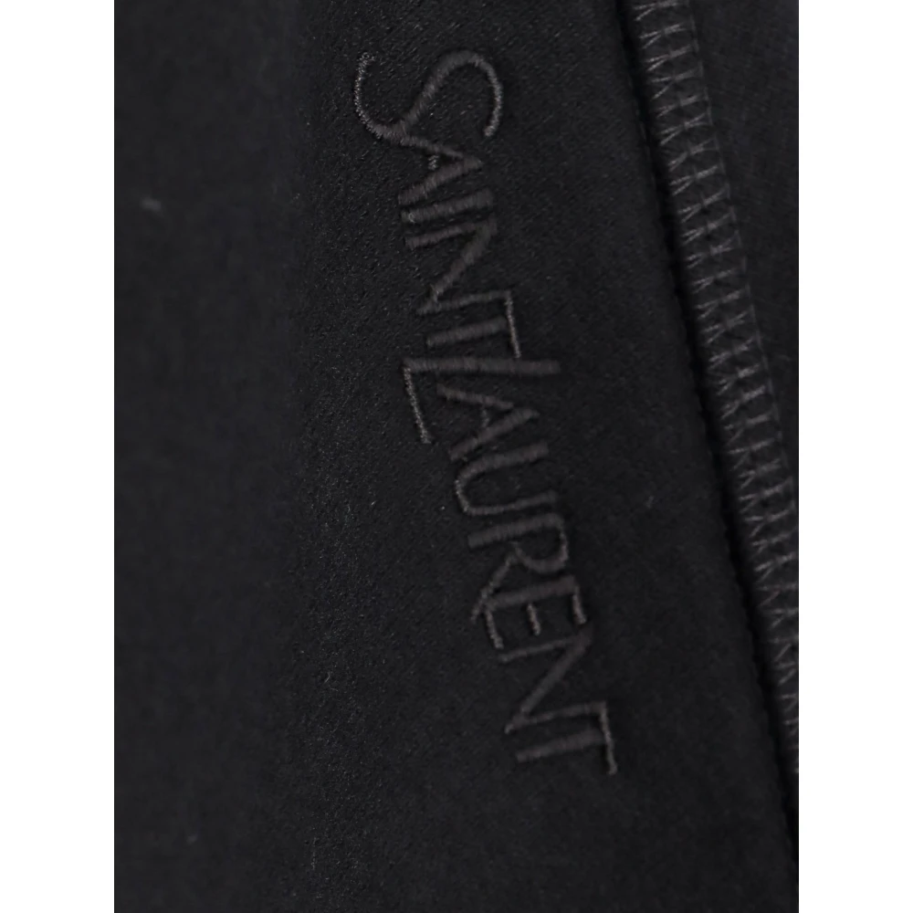 Saint Laurent Zwarte Leggings met Logo en Asymmetrische Onderkant Black Dames