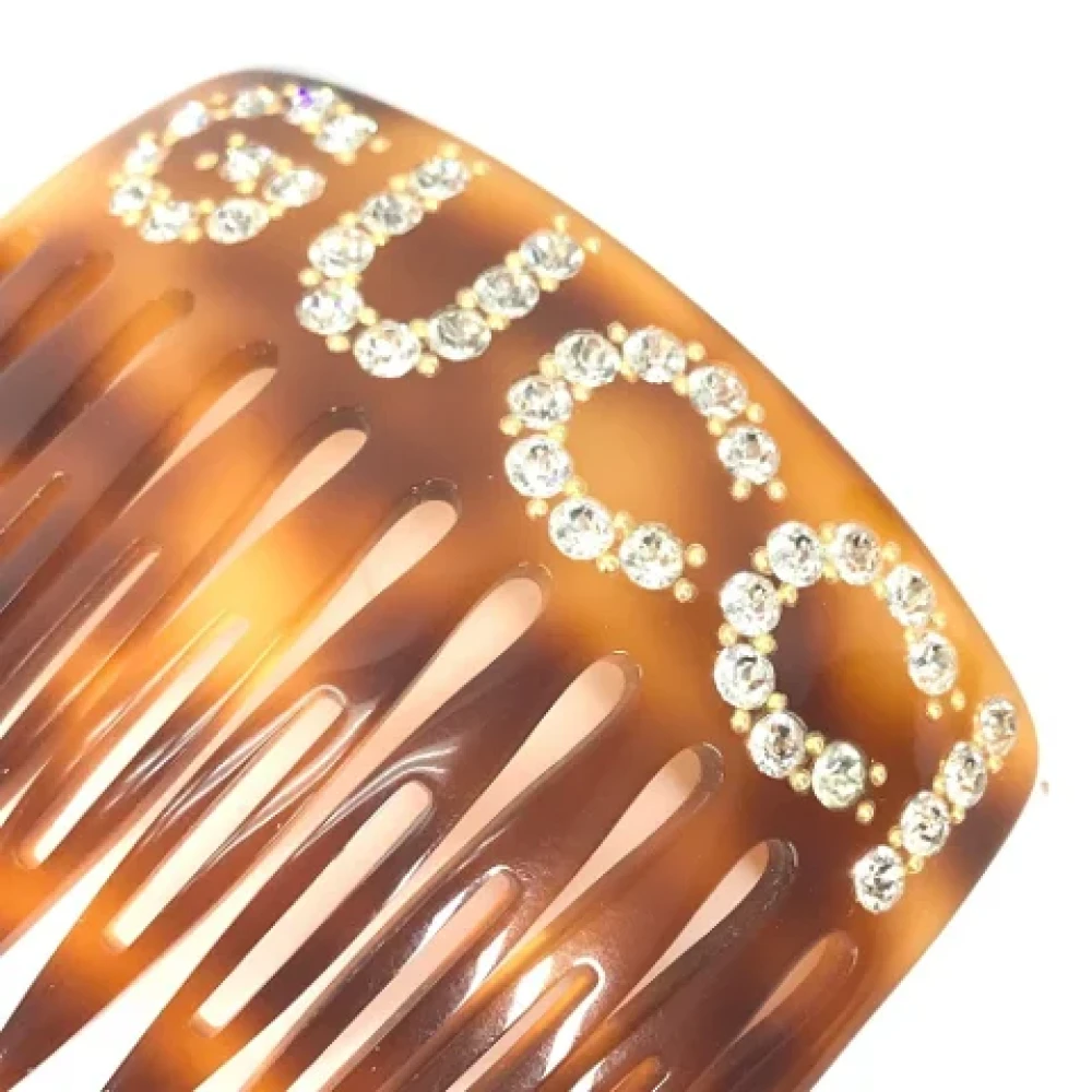 Gucci Vintage Pre-owned Plastic hair-accessories Brown Dames