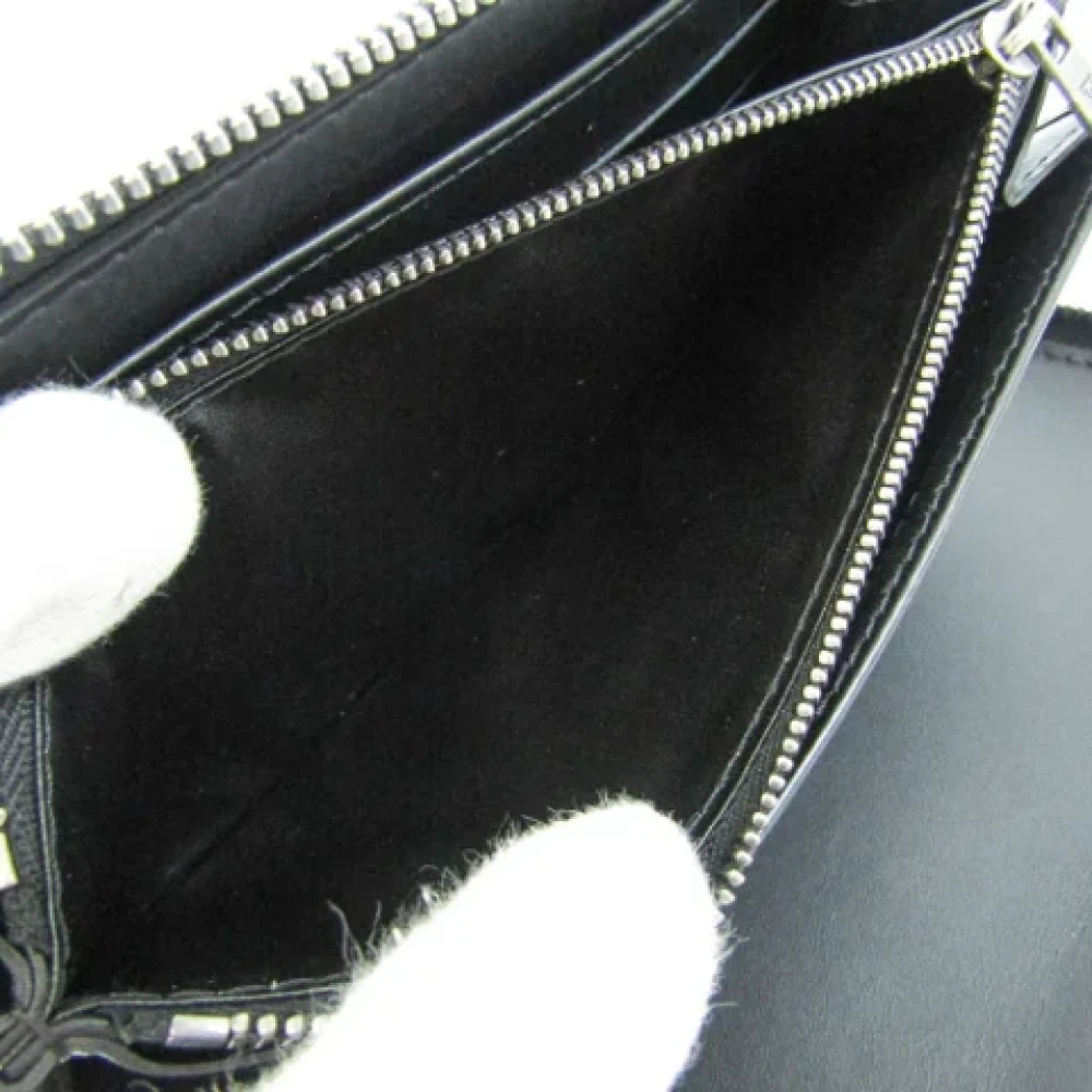 Louis Vuitton Vintage Pre-owned Leather wallets Black Heren