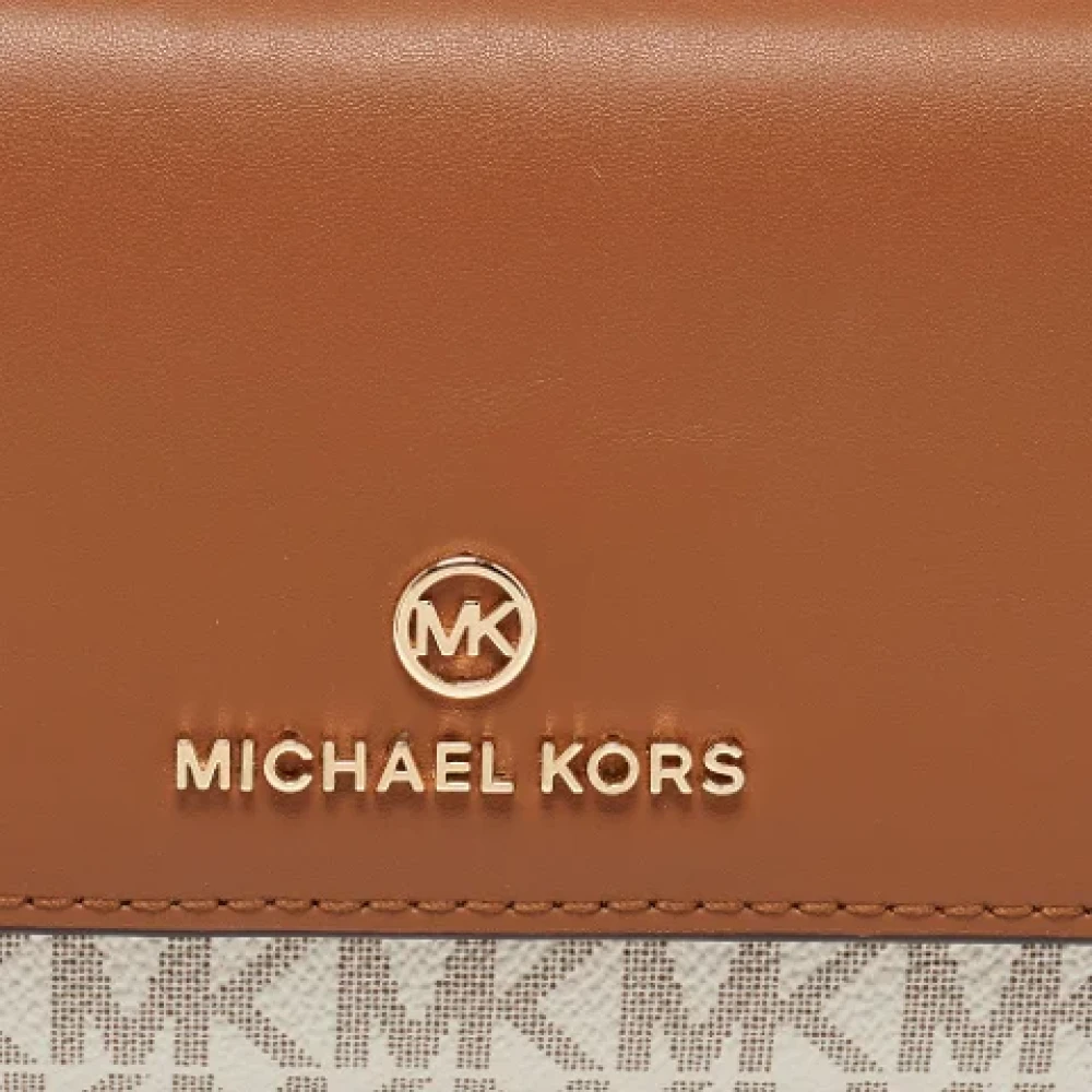 Michael Kors Pre-owned Leather wallets Brown Dames
