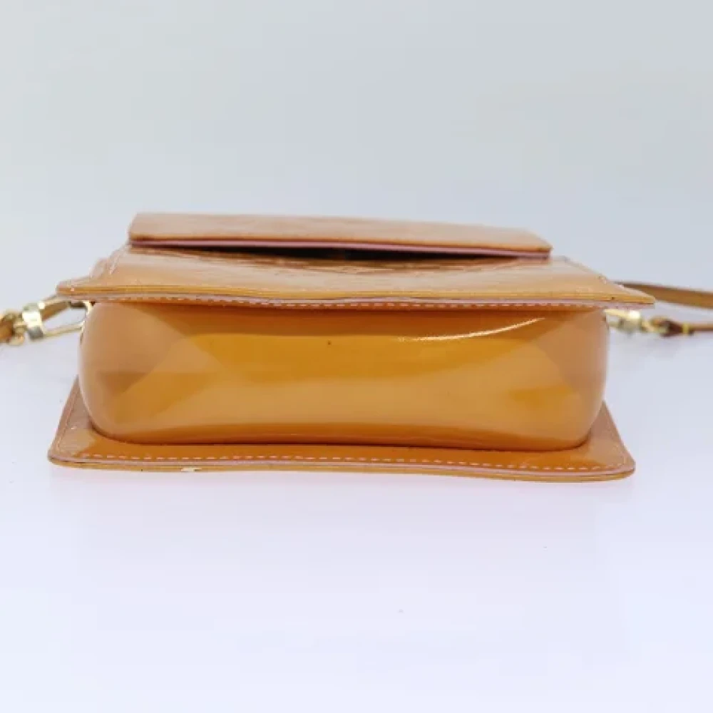 Louis Vuitton Vintage Pre-owned Leather pouches Yellow Dames
