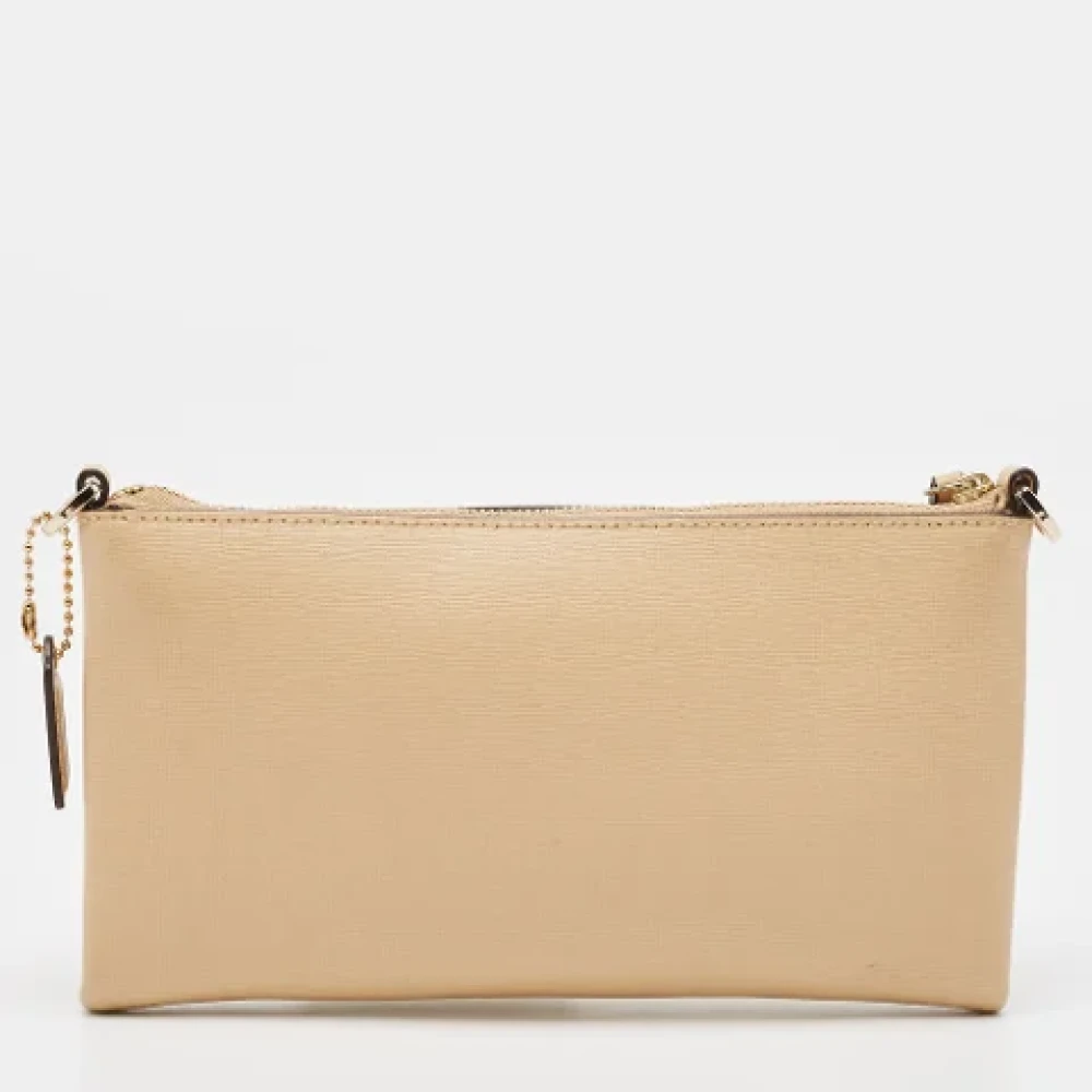 Coach Pre-owned Leather clutches Beige Dames