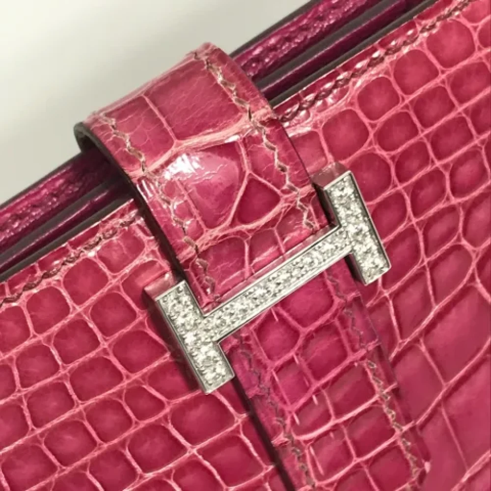 Hermès Vintage Pre-owned Leather wallets Red Dames