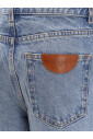 blue-jeans-with-leather-logo-patch