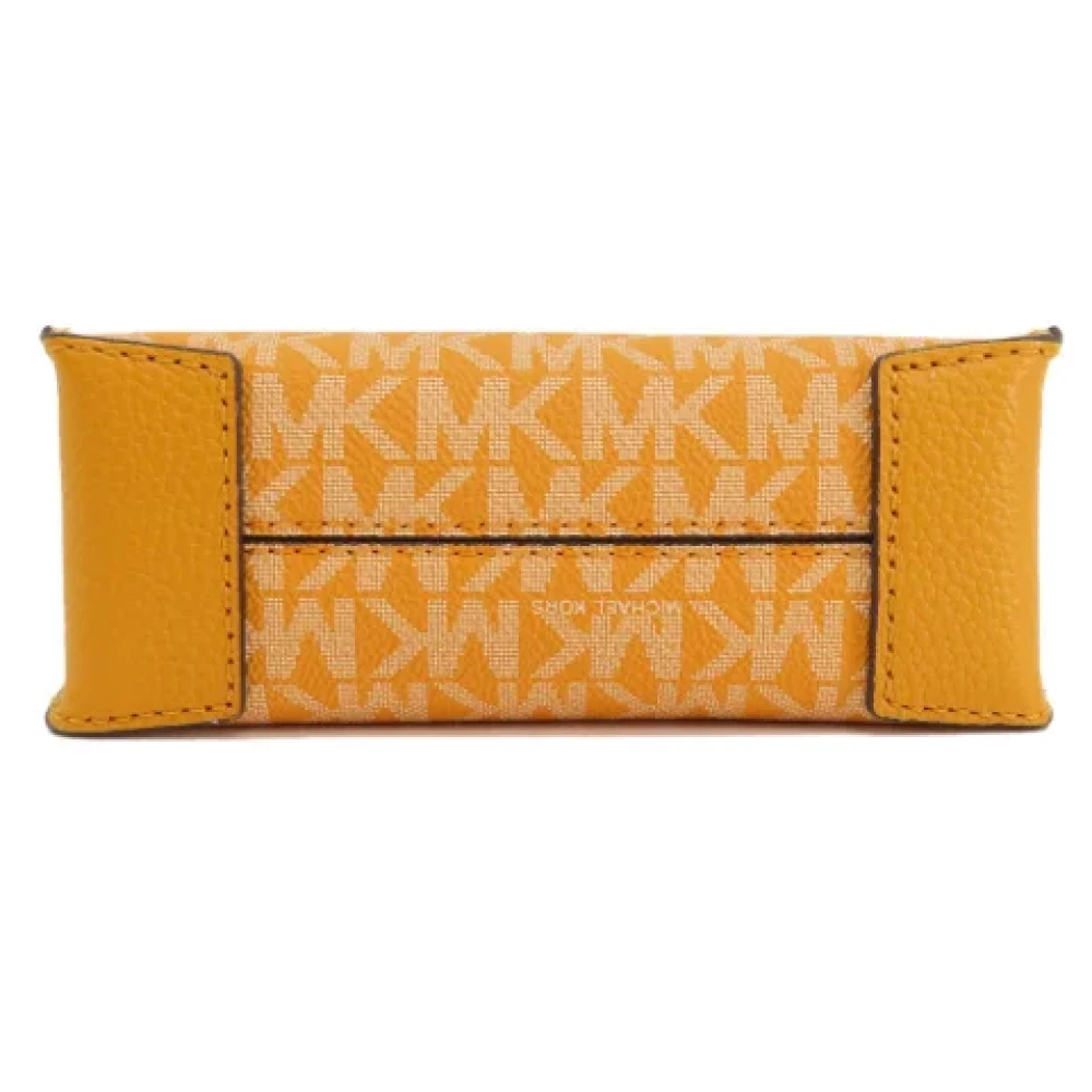 Michael Kors Pre-owned Canvas handbags Yellow Dames