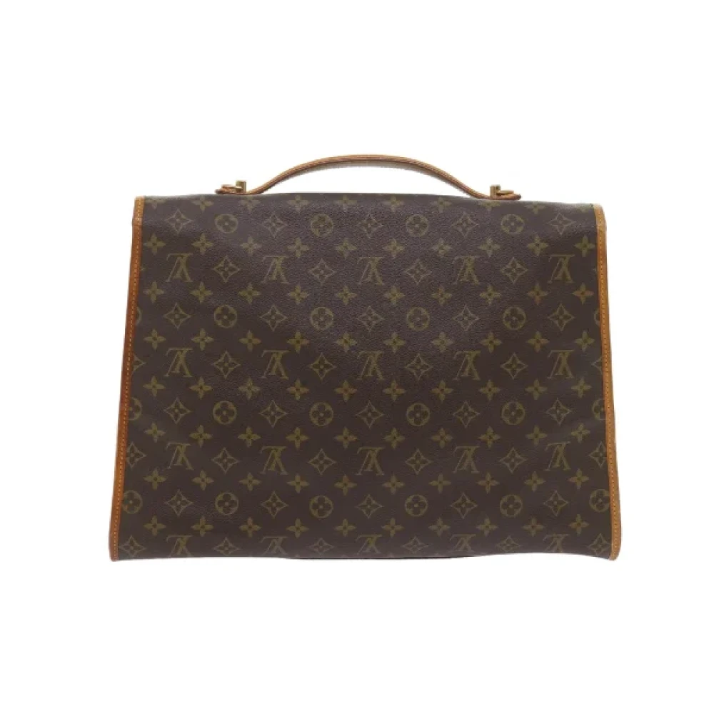 Louis Vuitton Vintage Pre-owned Cotton handbags Brown Heren
