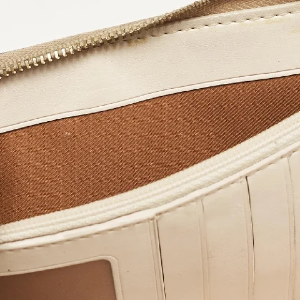 Coach Pre-owned Coated canvas wallets Beige Dames