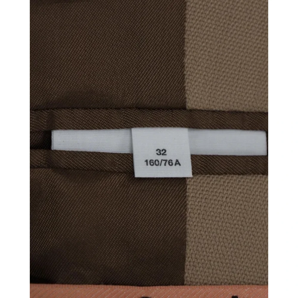 Acne Studios Pre-owned Polyester outerwear Beige Dames