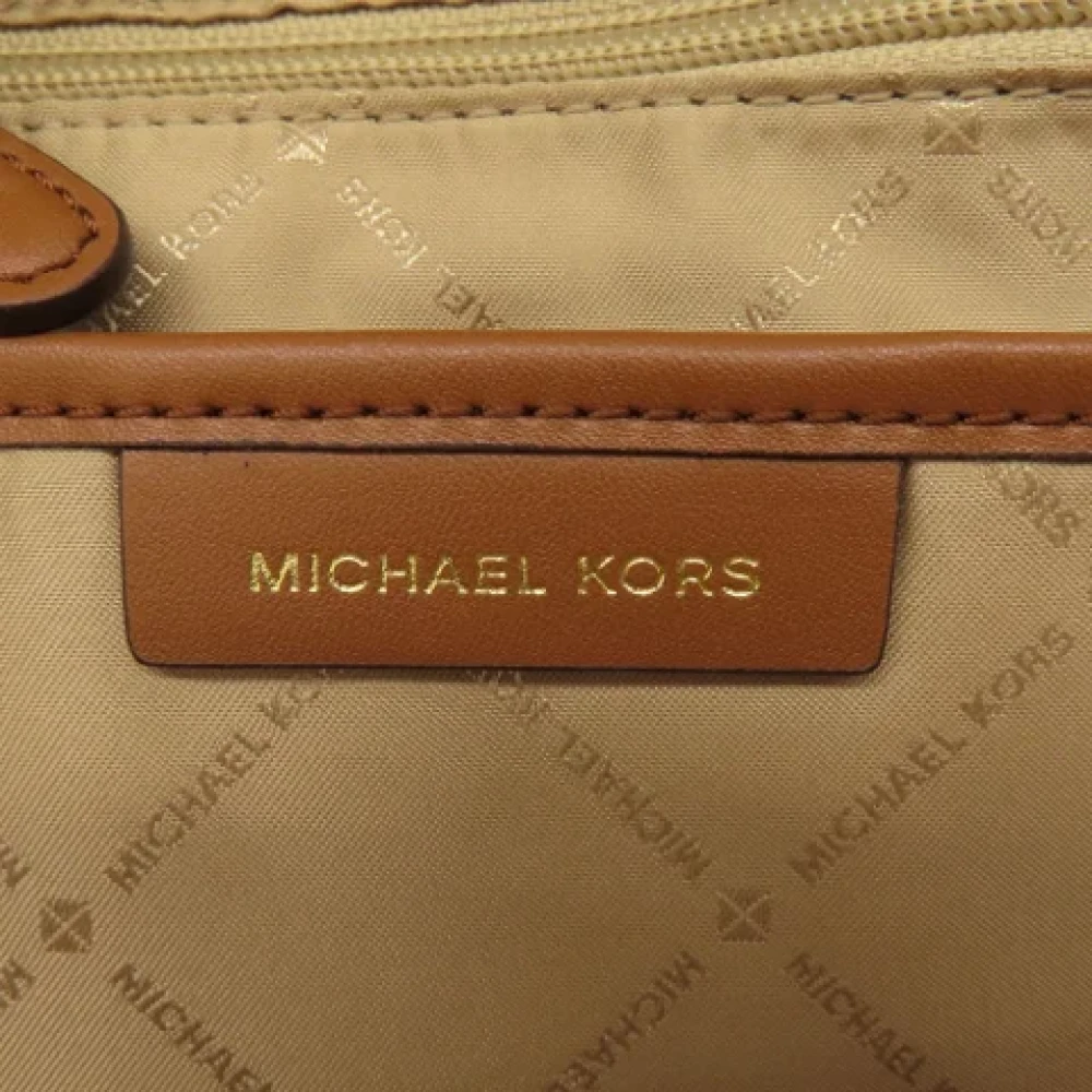 Michael Kors Pre-owned Plastic backpacks Brown Dames