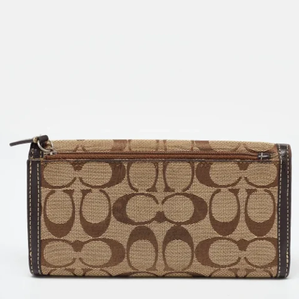 Coach Pre-owned Canvas wallets Beige Dames