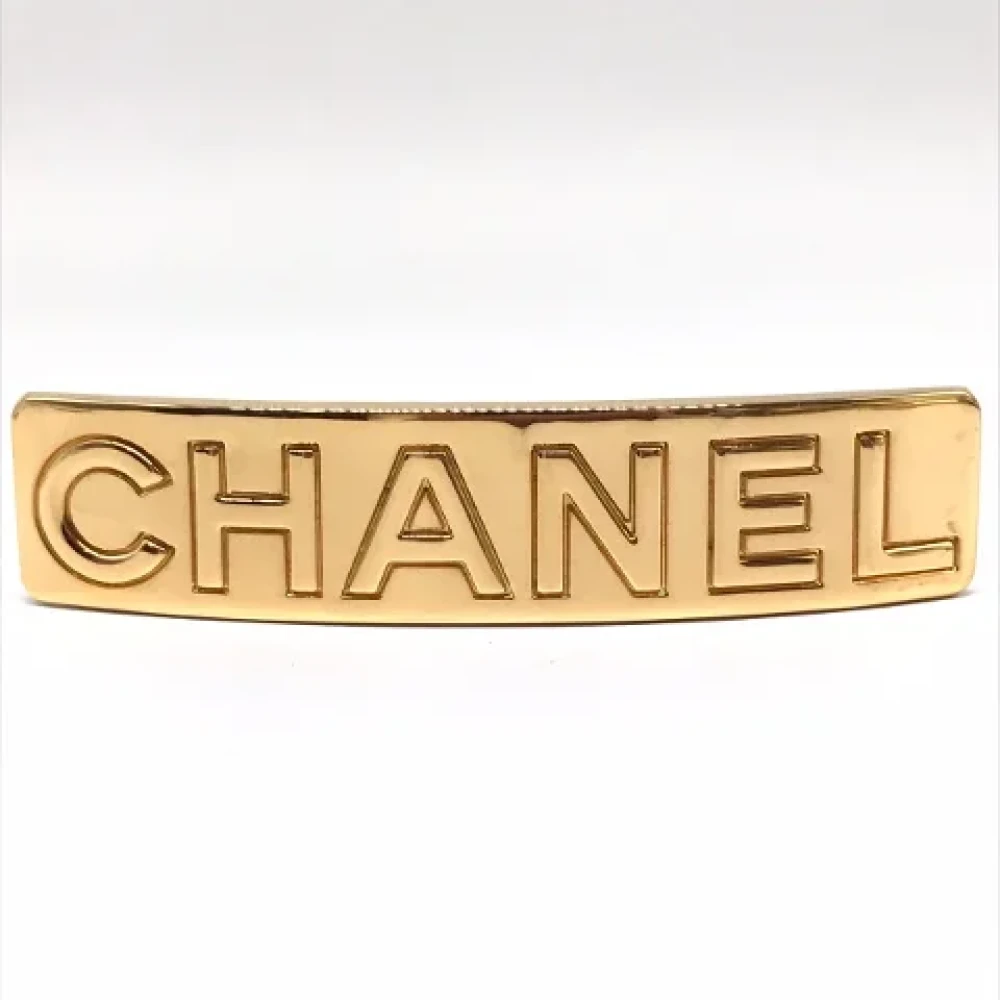 Chanel Vintage Pre-owned Metal hair-accessories Yellow Dames