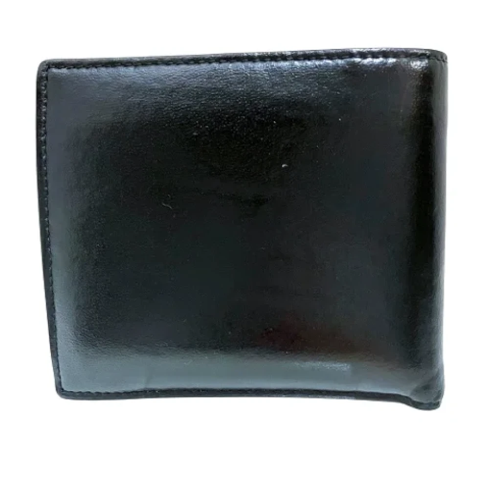 Saint Laurent Vintage Pre-owned Leather wallets Black Heren