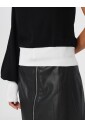 pull-a-blocs-de-couleur-a-une-epaule