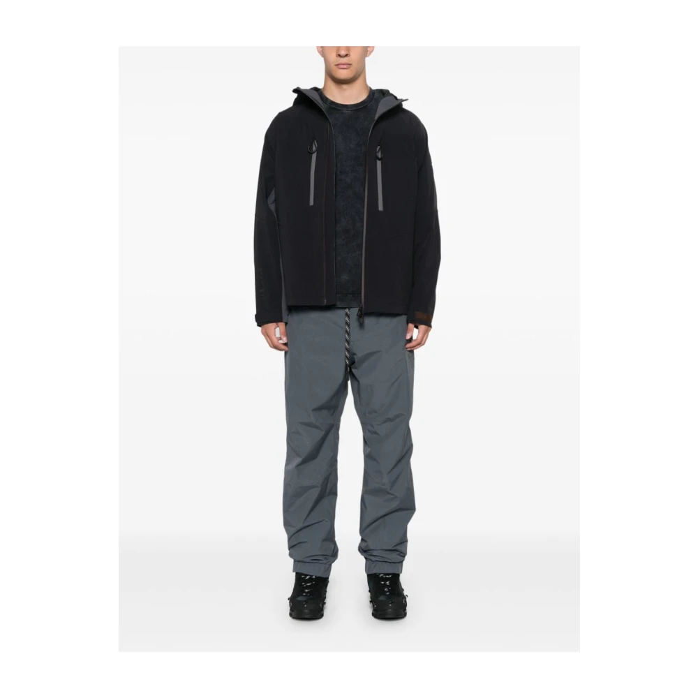 Moncler Grijze gewatteerde broek met reflecterende details Gray Heren