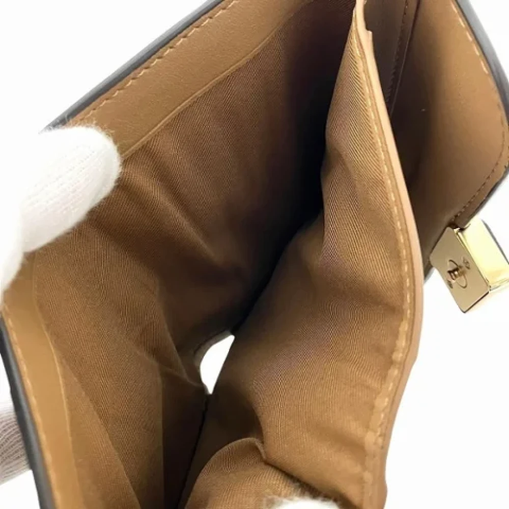 Coach Pre-owned Leather wallets Brown Dames
