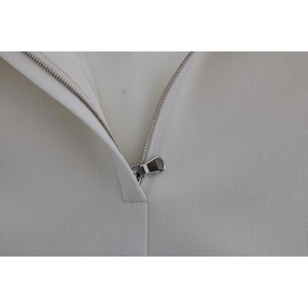 Dolce & Gabbana Elegante witte wollen shiftjurk met gouden broche White Dames