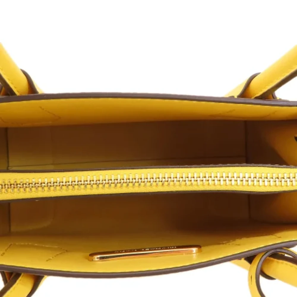 Michael Kors Pre-owned Fabric handbags Yellow Dames