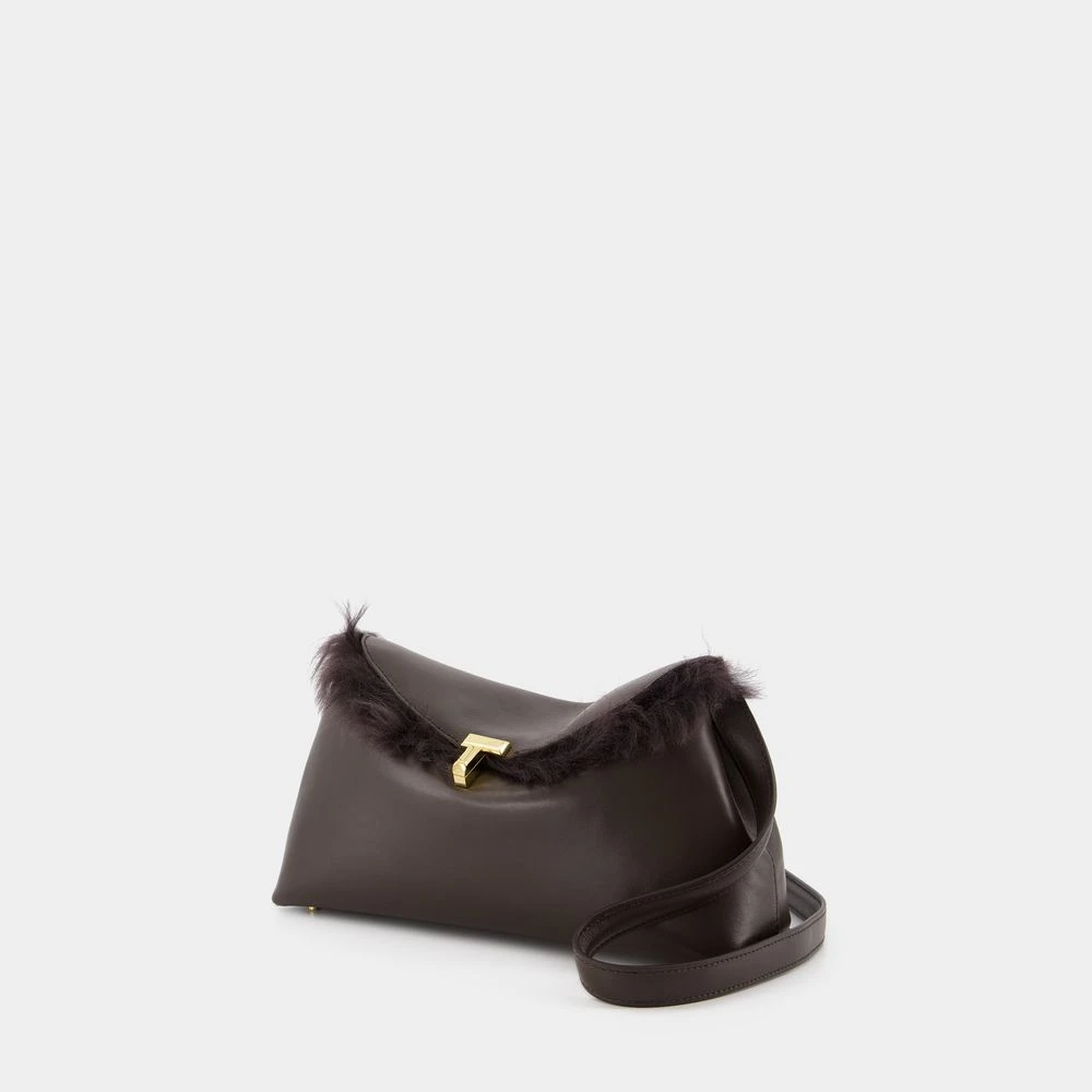 TotêMe Shearling T-Lock Clutch Bruin Brown Dames