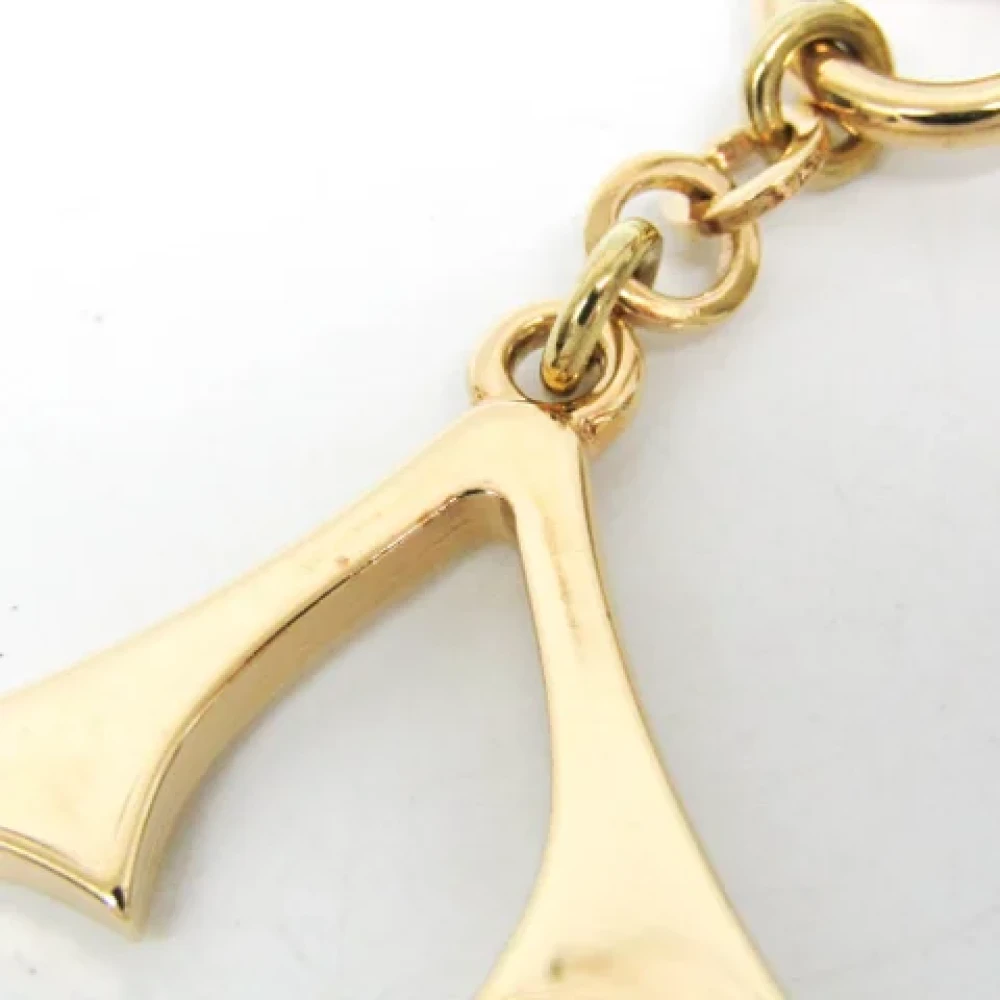 Louis Vuitton Vintage Pre-owned Metal key-holders Yellow Dames