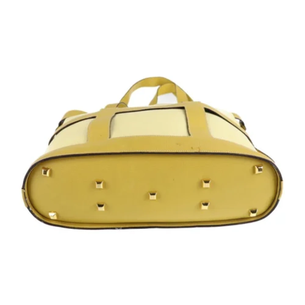 Salvatore Ferragamo Pre-owned Canvas handbags Yellow Dames