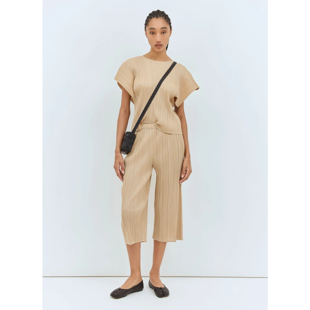 Issey Miyake Wijde Plooiende Broek Beige Dames