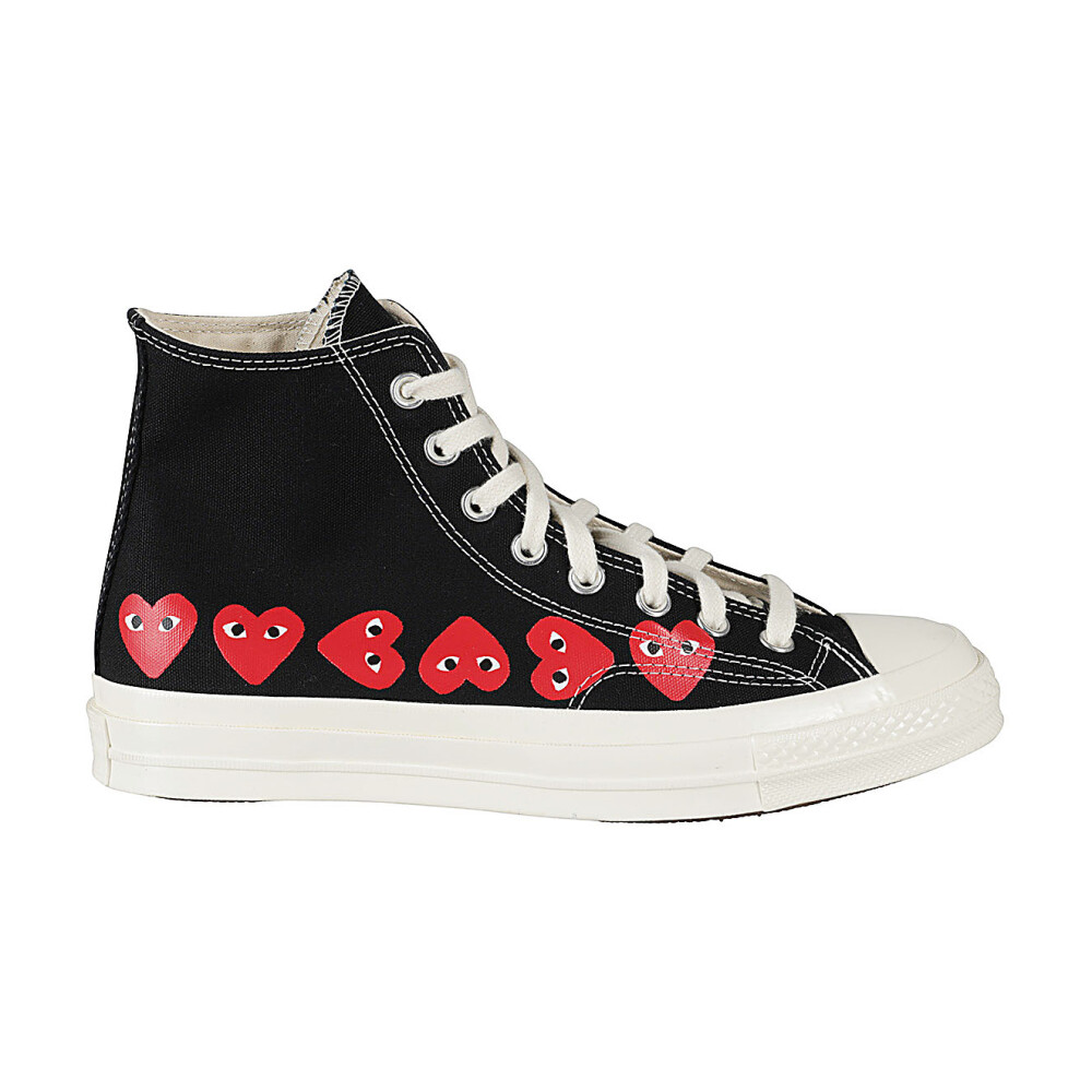 Compra moda de Comme des Garcons Play online en Miinto