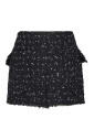 jupe-mini-en-tweed-a-pois-noirs