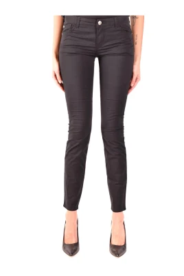 Jeans med dragkedja och knappknäppning med fickor