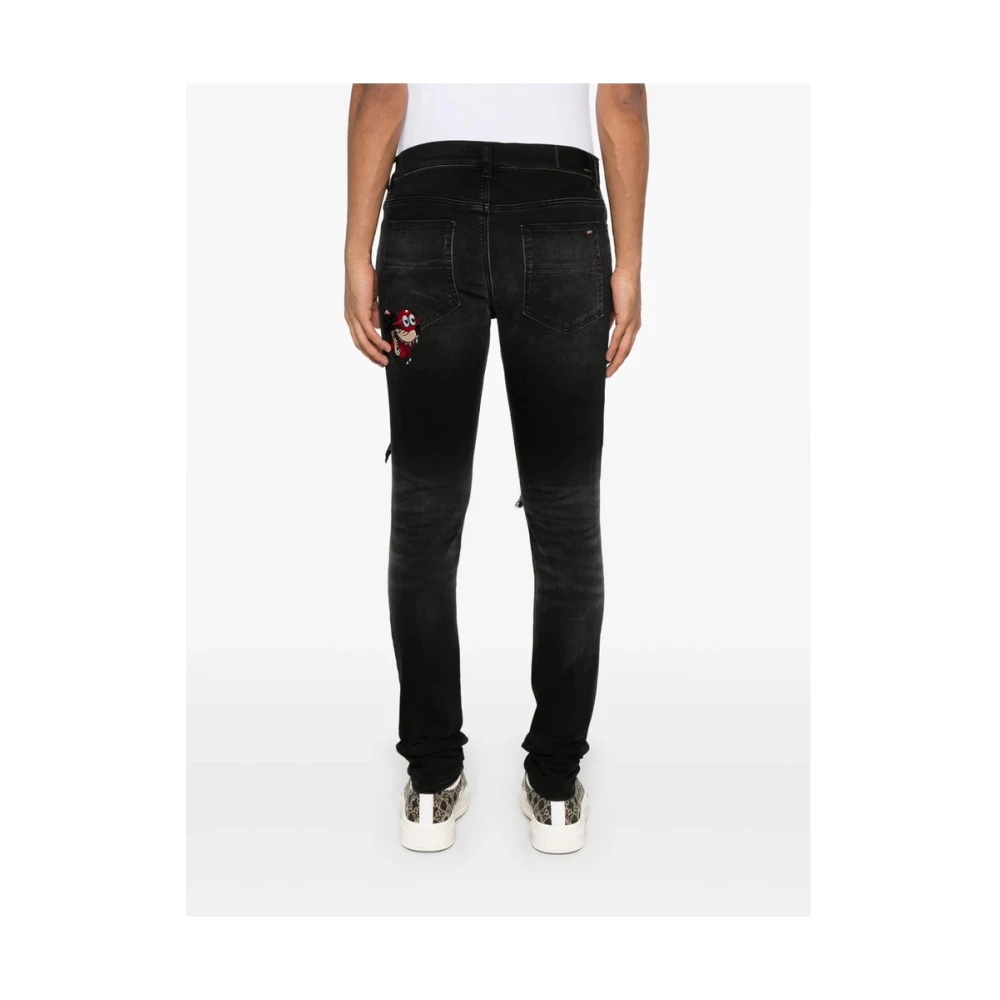 Amiri Zwarte Ripped Jeans met Geborduurd Motief Black Heren