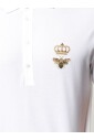 embroidered-emblem-polo-shirt-in-white
