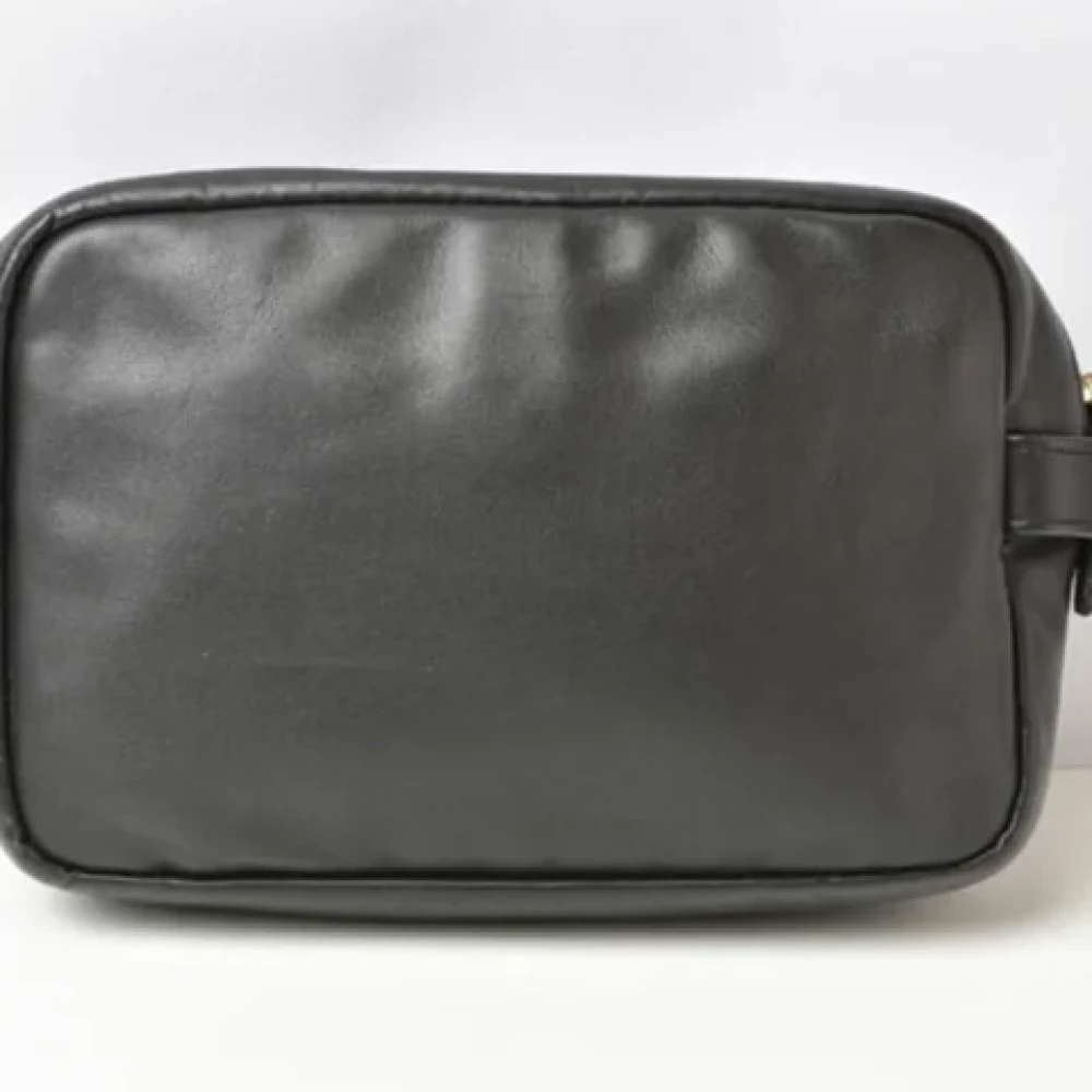 Coach Pre-owned Leather clutches Black Dames