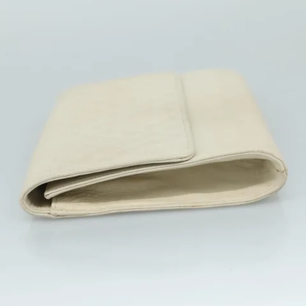 Saint Laurent Vintage Pre-owned Leather clutches Beige Dames